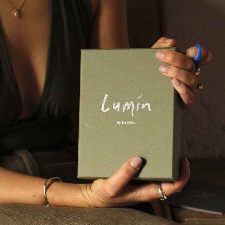 hands holding Le Mela Lumin kits